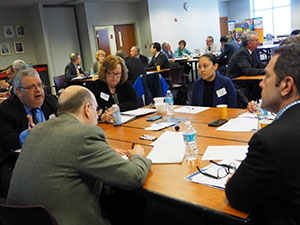 people talking at a table