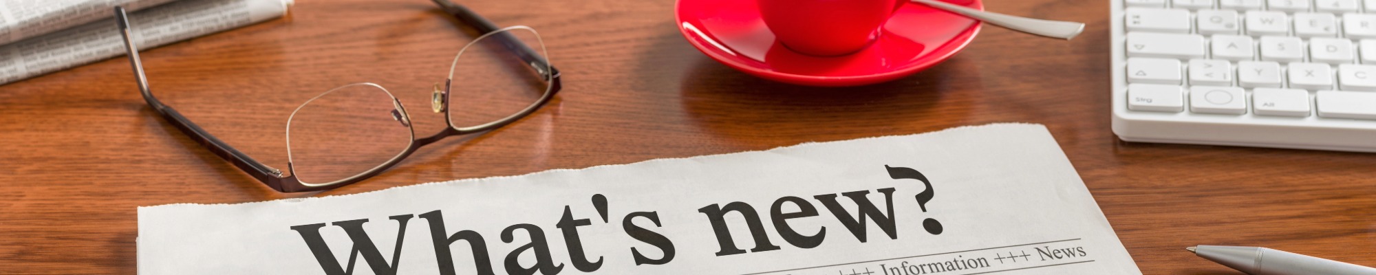 newspaper and glasses